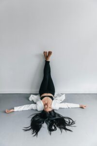 Legs-Up-The-Wall Pose for stress relief - Restorative yoga pose.